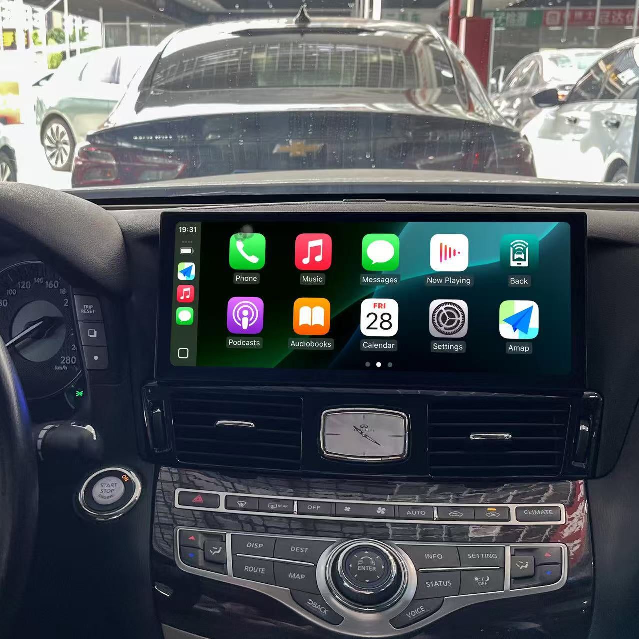 Roadnavier 12.3-inch ultra-wide Android head unit running wireless Apple CarPlay installed in Infiniti Q70 and M37 interior