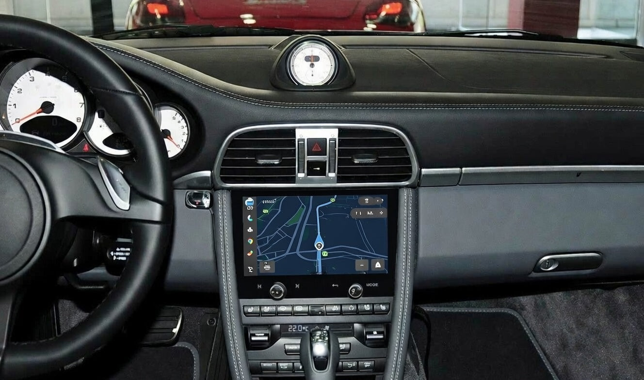 Rear view of Roadnavier Porsche unit showing cooling fins and plug-and-play wiring ports.