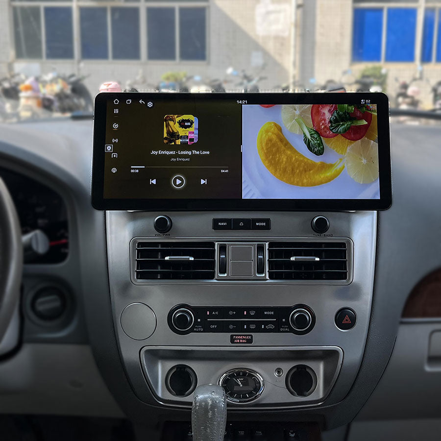 Multitasking split screen mode showing music player and video on 17 inch Android screen