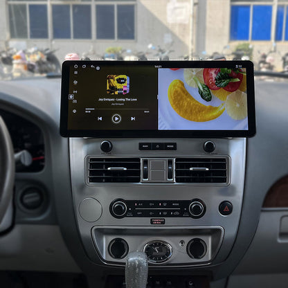 Multitasking split screen mode showing music player and video on 17 inch Android screen