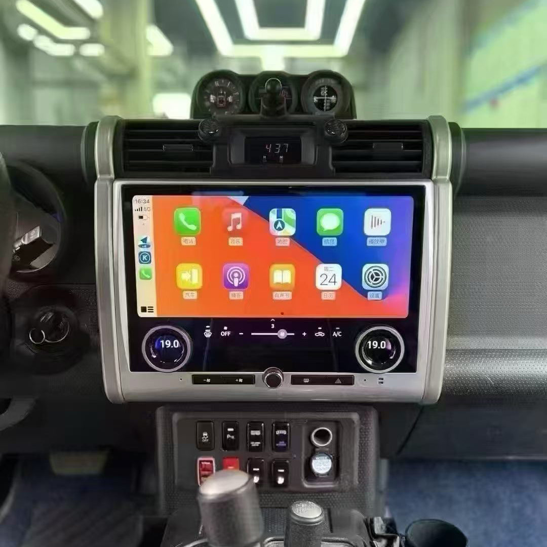 Installed 13.3 inch Android stereo in a Toyota FJ Cruiser interior, showcasing wireless Apple CarPlay on the screen
